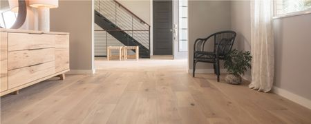 Light wood flooring in a modern home hallway and living space | Country Manor Decorating